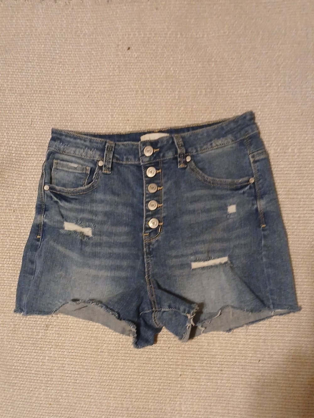 Altar'd State Distressed Button-Fly Denim Shorts in Light Blue